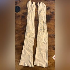 Vintage long leather opera gloves.  Apx 21 inches long.